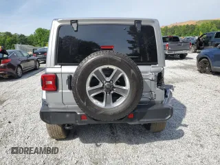 2021 Jeep Wrangler Unlimited Sahara Altitude with VIN 1C4HJXEN3MW691220, listed as a Copart auction lot 56334695 with 46,589 mi miles and Salvage title. Bid and sale history available at DreamBid. Image 6.