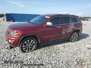2018 Jeep Grand Cherokee Sterling with VIN 1C4RJFBT1JC148768, listed as a Copart auction lot 63847985 with 165,848 mi miles and Salvage title. Bid and sale history available at DreamBid. Image 1.