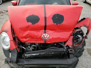 2013 Volkswagen Beetle with VIN 3VWHX7AT8DM604332, listed as a Copart auction lot 79781264 with 125,692 mi miles and Salvage Title. Bid and sale history available at DreamBid. Image 12.