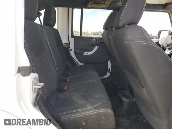 2014 Jeep Wrangler Unlimited Sahara with VIN 1C4BJWEG1EL210949, listed as a Copart auction lot 60977555 with 122,495 mi miles and Salvage title. Bid and sale history available at DreamBid. Image 11.