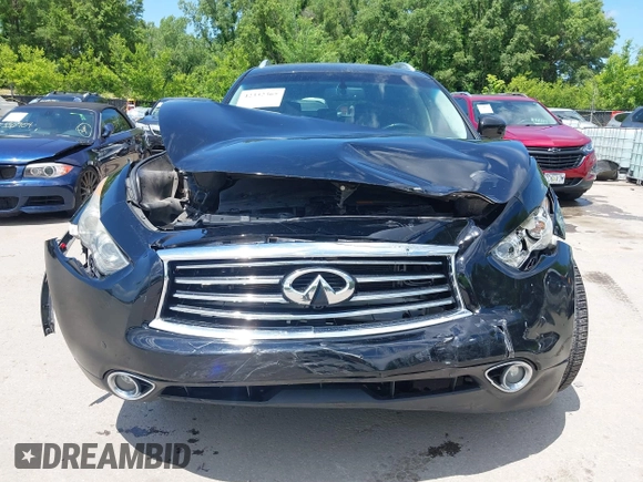 2015 Infiniti QX70 with VIN JN8CS1MW1FM482625, listed as a IAAI auction lot 42332365 with 88,912 mi miles and . Bid and sale history available at DreamBid. Image 12.