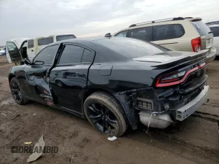 2017 Dodge Charger SXT with VIN 2C3CDXHG6HH606426, listed as a Copart auction lot 52100185 with 122,910 mi miles and Salvage Title. Bid and sale history available at DreamBid. Image 2.
