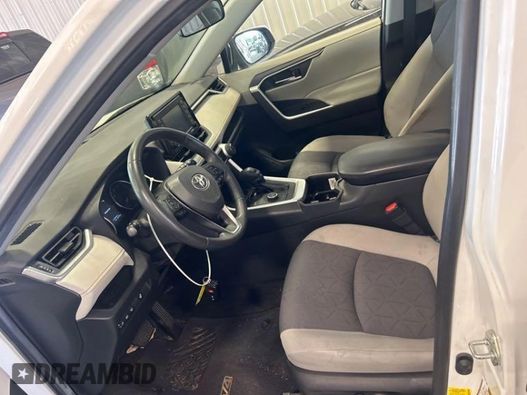 2022 Toyota RAV4 Hybrid XLE with VIN JTMRWRFV1ND164886, listed as a IAAI auction lot 42718931 with 97,775 mi miles and . Bid and sale history available at DreamBid. Image 1.