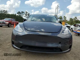 2024 Tesla Model Y Long Range z VIN 7SAYGAEE7RF123224, wystawiony jako Copart lot #58410545 z przebiegiem Nie podano mil oraz Szkoda całkowita • Salvage title. Historia ofert i sprzedaży dostępna na DreamBid. Obrazek 5.