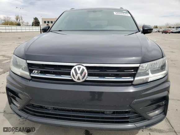 2020 Volkswagen Tiguan SE with VIN 3VV2B7AX8LM114368, listed as a Copart auction lot 50949875 with 69,046 mi miles and Salvage Title. Bid and sale history available at carsss.com. Image 5.