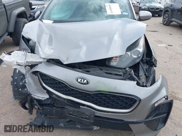 2020 Kia Sportage LX with VIN KNDPM3AC5L7720838, listed as a IAAI auction lot 41458808 with 52,689 mi miles and . Bid and sale history available at DreamBid. Image 6.