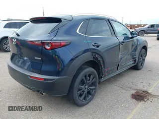 2024 Mazda CX-30 S Select Sport with VIN 3MVDMBBM3RM655084, listed as a IAAI auction lot 42213293 with 27,187 mi miles and . Bid and sale history available at carsss.com. Image 4.