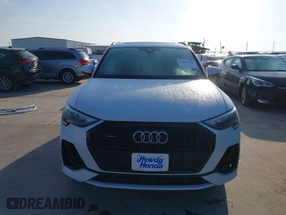 2021 Audi Q3 S line Premium z VIN WA1DECF35M1063868, wystawiony jako IAAI lot #42247128 z przebiegiem 89 959 mil mil oraz . Historia ofert i sprzedaży dostępna na DreamBid. Obrazek 12.