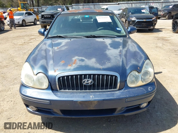 2003 Hyundai Sonata with VIN KMHWF25S93A887316, listed as a IAAI auction lot 41714217 with 299,890 mi miles. Bid and sale history available at carsss.com. Image 6.