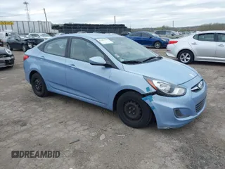 2014 Hyundai Accent GLS with VIN KMHCT4AE3EU702573, listed as a IAAI auction lot 42083350 with 123,392 mi miles. Bid and sale history available at carsss.com. Image 1.