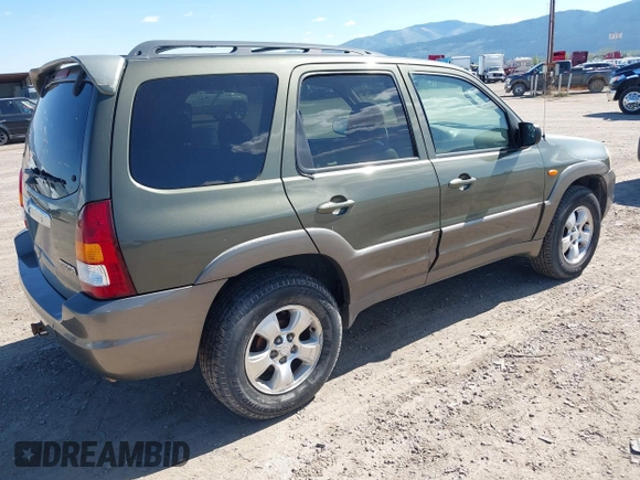 2002 Mazda Tribute LX with VIN 4F2CU08152KM02067, listed as a IAAI auction lot 42198970 with 212,613 mi miles and . Bid and sale history available at carsss.com. Image 4.