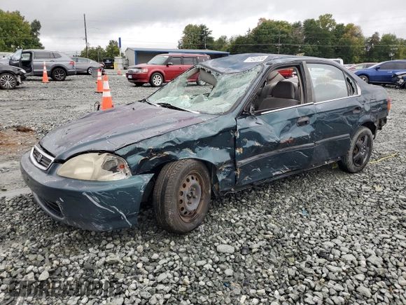 1997 Honda Civic DX with VIN JHMEJ6624VS038386, listed as a Copart auction lot 71541574 with 385,295 mi miles and Salvage Title. Bid and sale history available at carsss.com. Image 1.