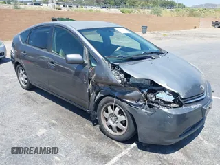 2007 Toyota Prius z VIN JTDKB20U073229031, wystawiony jako IAAI lot #42456806 z przebiegiem 128 977 mil mil oraz . Historia ofert i sprzedaży dostępna na DreamBid. Obrazek 1.