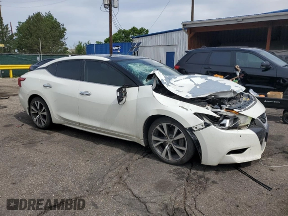 2017 Nissan Maxima Platinum with VIN 1N4AA6AP6HC367629, listed as a Copart auction lot 58747285 with 136,672 mi miles and Salvage title. Bid and sale history available at DreamBid. Image 4.