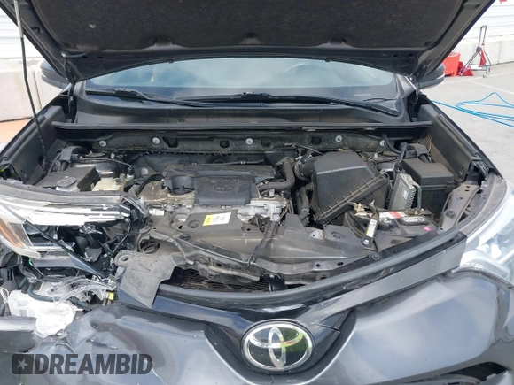 2017 Toyota RAV4 SE with VIN JTMJFREV5HJ155712, listed as a IAAI auction lot 42613998 with 72,112 mi miles and . Bid and sale history available at DreamBid. Image 10.