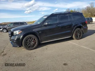 2018 Mercedes-Benz GLS with VIN 4JGDF7FE5JB060580, listed as a Copart auction lot 74040014 with 62,749 mi miles and Salvage Title. Bid and sale history available at carsss.com. Image 1.