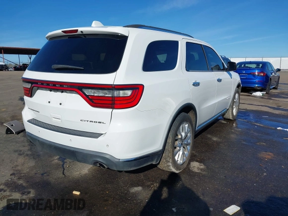 2015 Dodge Durango Citadel with VIN 1C4RDHEG4FC729108, listed as a IAAI auction lot 41340776 with 211,806 mi miles and . Bid and sale history available at DreamBid. Image 4.
