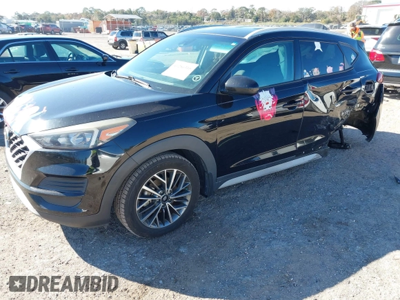 2019 Hyundai Tucson Sport with VIN KM8J33AL5KU902933, listed as a IAAI auction lot 41286316 with 73,799 mi miles. Bid and sale history available at carsss.com. Image 18.