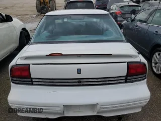 1997 Oldsmobile Cutlass Supreme S z VIN 1G3WH52M2VF322529, wystawiony jako Copart lot #52003574 z przebiegiem 140 292 mil mil oraz Szkody całkowita. Historia ofert i sprzedaży dostępna na DreamBid. Obrazek 6.