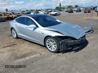 2016 Tesla Model S 90D with VIN 5YJSA1E22GF174637, listed as a IAAI auction lot 42234083 with 142,915 mi miles and . Bid and sale history available at DreamBid. Image 1.