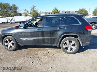 2014 Jeep Grand Cherokee Limited with VIN 1C4RJFBM8EC298326, listed as a IAAI auction lot 41307009 with 122,663 mi miles. Bid and sale history available at carsss.com. Image 14.