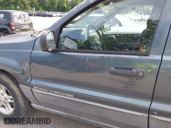 2002 Jeep Grand Cherokee Laredo with VIN 1J4GW48S92C150162, listed as a IAAI auction lot 42471732 with 171,677 mi miles and . Bid and sale history available at DreamBid. Image 13.