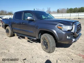 2022 Toyota Tacoma 4WD SR with VIN 3TMCZ5AN1NM495405, listed as a Copart auction lot 49080125 with 32,192 mi miles and Salvage Title. Bid and sale history available at carsss.com. Image 4.