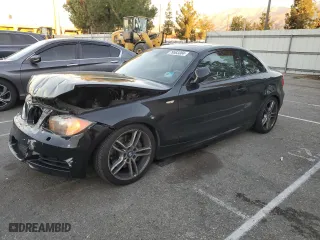 2011 BMW 1 Series 135i with VIN WBAUC9C59BVM10741, listed as a Copart auction lot 79583304 with 128,300 mi miles and Salvage Title. Bid and sale history available at carsss.com. Image 1.