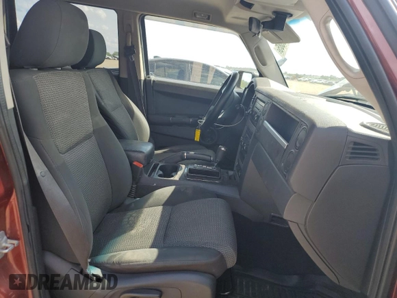 2009 Jeep Commander Sport z VIN 1J8HH48K79C501349, wystawiony jako Copart lot #62368885 z przebiegiem 191 923 mil mil oraz Szkoda całkowita • Salvage title. Historia ofert i sprzedaży dostępna na DreamBid. Obrazek 7.