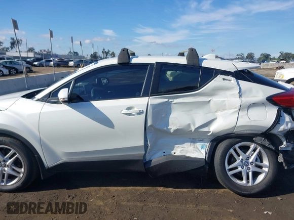 2020 Toyota C-HR LE with VIN JTNKHMBX6L1076433, listed as a IAAI auction lot 40975841 with 20,687 mi miles. Bid and sale history available at carsss.com. Image 15.