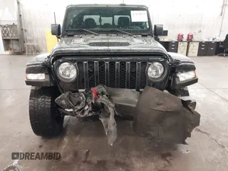 2021 Jeep Gladiator Rubicon with VIN 1C6JJTBGXML529108, listed as a IAAI auction lot 42139924 with 32,204 mi miles and . Bid and sale history available at DreamBid. Image 6.
