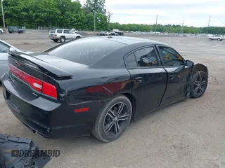 2014 Dodge Charger RT Plus with VIN 2C3CDXDT6EH187041, listed as a IAAI auction lot 39443589 with 62,981 mi miles. Bid and sale history available at carsss.com. Image 4.