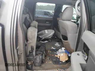 2005 Ford F-150 XLT z VIN 1FTRW12WX5FA87200, wystawiony jako Copart lot #55939875 z przebiegiem Nie podano mil oraz Szkoda całkowita • Salvage title. Historia ofert i sprzedaży dostępna na DreamBid. Obrazek 10.