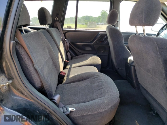 2000 Jeep Grand Cherokee Laredo with VIN 1J4GW48S6YC404063, listed as a Copart auction lot 59442725 with 268,543 mi miles and Salvage title. Bid and sale history available at DreamBid. Image 11.