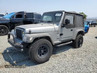 2001 Jeep Wrangler Sport с VIN 1J4FA49S41P353878, выставлен на аукционе Copart как лот 64637385 с пробегом 166 642 миль миль и Списание • Salvage title. История ставок и продаж доступна на DreamBid. Изображение 1.