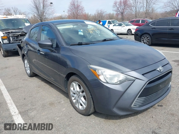2018 Toyota Yaris with VIN 3MYDLBYV2JY321213, listed as a IAAI auction lot 41890815 with 94,089 mi miles and . Bid and sale history available at DreamBid. Image 1.