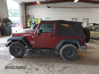 2009 Jeep Wrangler X with VIN 1J4FA24169L756377, listed as a IAAI auction lot 42718401 with 161,565 mi miles and . Bid and sale history available at DreamBid. Image 14.