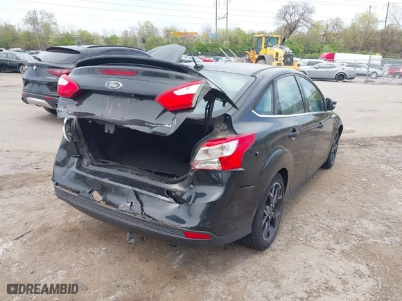 2012 Ford Focus Titanium with VIN 1FAHP3J2XCL369554, listed as a IAAI auction lot 42072931 with 95,474 mi miles. Bid and sale history available at carsss.com. Image 13.