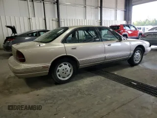 1995 Oldsmobile LSS z VIN 1G3HY5215SH307862, wystawiony jako Copart lot #69297244 z przebiegiem 129 142 mil mil oraz Szkody całkowita. Historia ofert i sprzedaży dostępna na DreamBid. Obrazek 3.