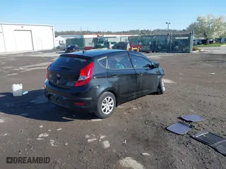 2014 Hyundai Accent GS with VIN KMHCT5AE0EU189319, listed as a IAAI auction lot 41985071 with 72,633 mi miles. Bid and sale history available at carsss.com. Image 4.