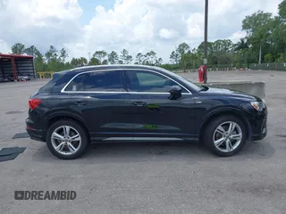 2020 Audi Q3 S line Premium Plus with VIN WA1EECF33L1052774, listed as a IAAI auction lot 42199200 with 55,008 mi miles and . Bid and sale history available at DreamBid. Image 13.