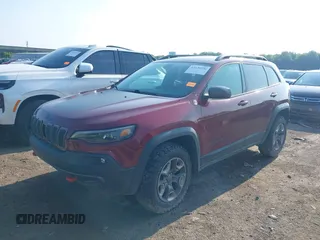 2019 Jeep Cherokee Trailhawk with VIN 1C4PJMBX5KD421043, listed as a IAAI auction lot 42570336 with 114,463 mi miles and . Bid and sale history available at DreamBid. Image 16.