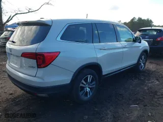 2016 Honda Pilot EX-L with VIN 5FNYF6H52GB057395, listed as a IAAI auction lot 41483056 with 121,805 mi miles. Bid and sale history available at carsss.com. Image 4.