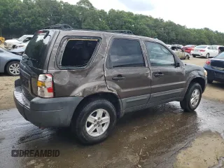 2006 Ford Escape XLS with VIN 1FMYU02Z56KD47674, listed as a Copart auction lot 60668134 with 248,535 mi miles and Salvage Title. Bid and sale history available at carsss.com. Image 3.