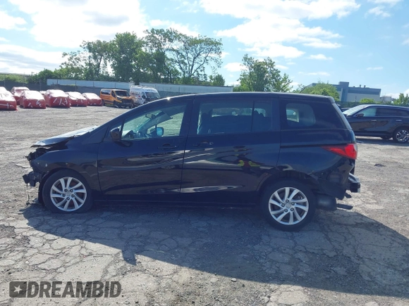 2012 Mazda 5 Sport with VIN JM1CW2BL9C0107826, listed as a IAAI auction lot 42297368 with Not provided miles and . Bid and sale history available at DreamBid. Image 13.