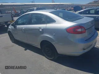 2013 Ford Fiesta S with VIN 3FADP4AJ0DM195196, listed as a IAAI auction lot 41817500 with 124,662 mi miles and . Bid and sale history available at DreamBid. Image 3.