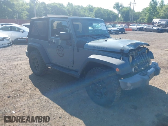 2015 Jeep Wrangler Freedom Edition with VIN 1C4AJWAG1FL714002, listed as a IAAI auction lot 42579024 with 98,732 mi miles and . Bid and sale history available at DreamBid. Image 1.