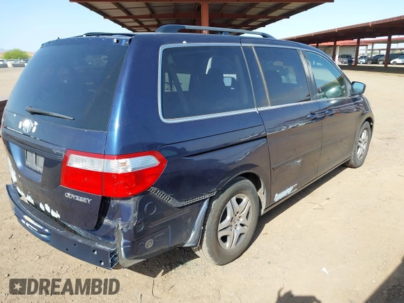 2005 Honda Odyssey EX-L with VIN 5FNRL38755B007567, listed as a IAAI auction lot 41952348 with 183,514 mi miles and . Bid and sale history available at carsss.com. Image 4.