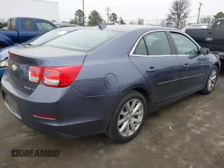 2014 Chevrolet Malibu LT with VIN 1G11E5SL8EF257754, listed as a IAAI auction lot 41208509 with 100,877 mi miles and . Bid and sale history available at DreamBid. Image 4.