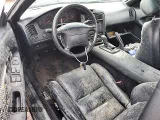 1992 Toyota MR2 z VIN JT2SW22N5N0058195, wystawiony jako Copart lot #74886194 z przebiegiem 158 816 mil mil oraz Nie do naprawy. Historia ofert i sprzedaży dostępna na DreamBid. Obrazek 8.
